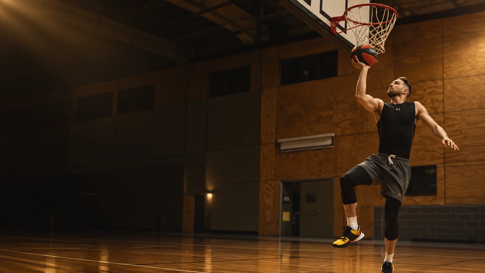 Jarrod Molnar finishing at the basket in a training gym